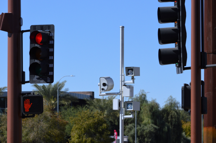 photo enforcement cameras monitor both red light and speed violations.