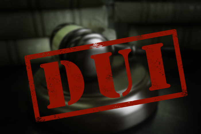 DUI ( Driving Under the Influence ) text in front of court legal gavel